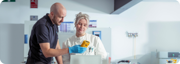 UKAS engineer with lab technician